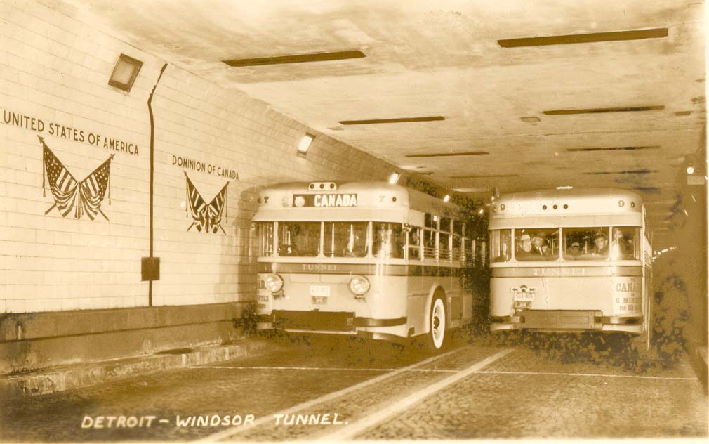 Black%20and%20white%20photograph%20of%20two%20buses%20in%20the%20Detroit-Windsor%20Tunnel